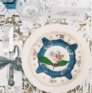 portfolio image from atwater lane styling of a wedding table setting in rich greens and deep blues