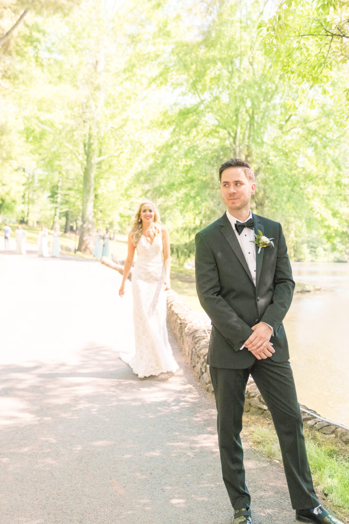 First look portraits with bride and groom at a summer garden wedding Airlie in Warrenton Virginia