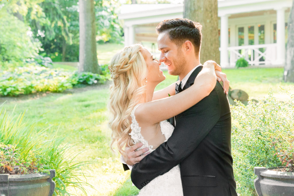 Romantic Portraits of the Bride and Groom for a summer garden wedding Airlie in Warrenton Virginia