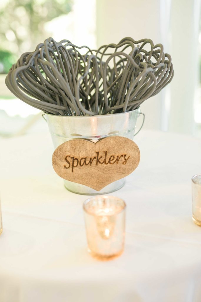 reception details of sparklers in a summer garden wedding Airlie in Warrenton Virginia