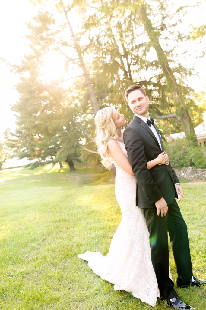 Romantic Portraits of the Bride and Groom for a summer garden wedding Airlie in Warrenton Virginia