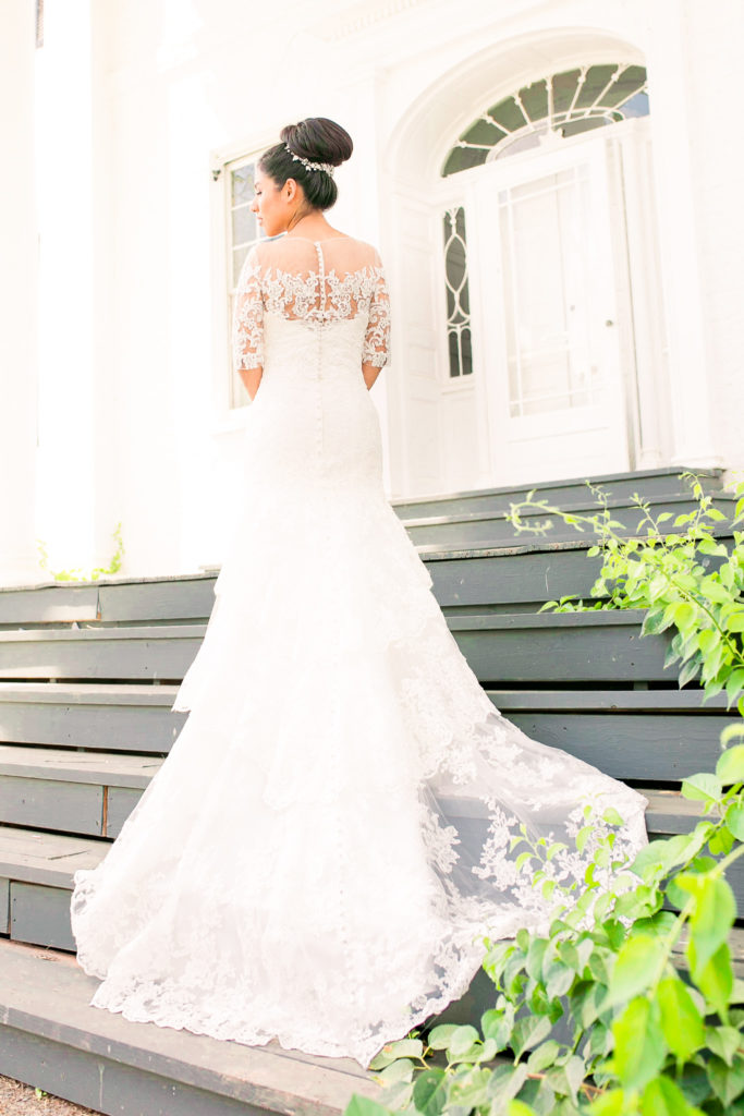 Portraits of Bride on the steps of Prospect Hall Mansion for a summer frederick maryland wedding