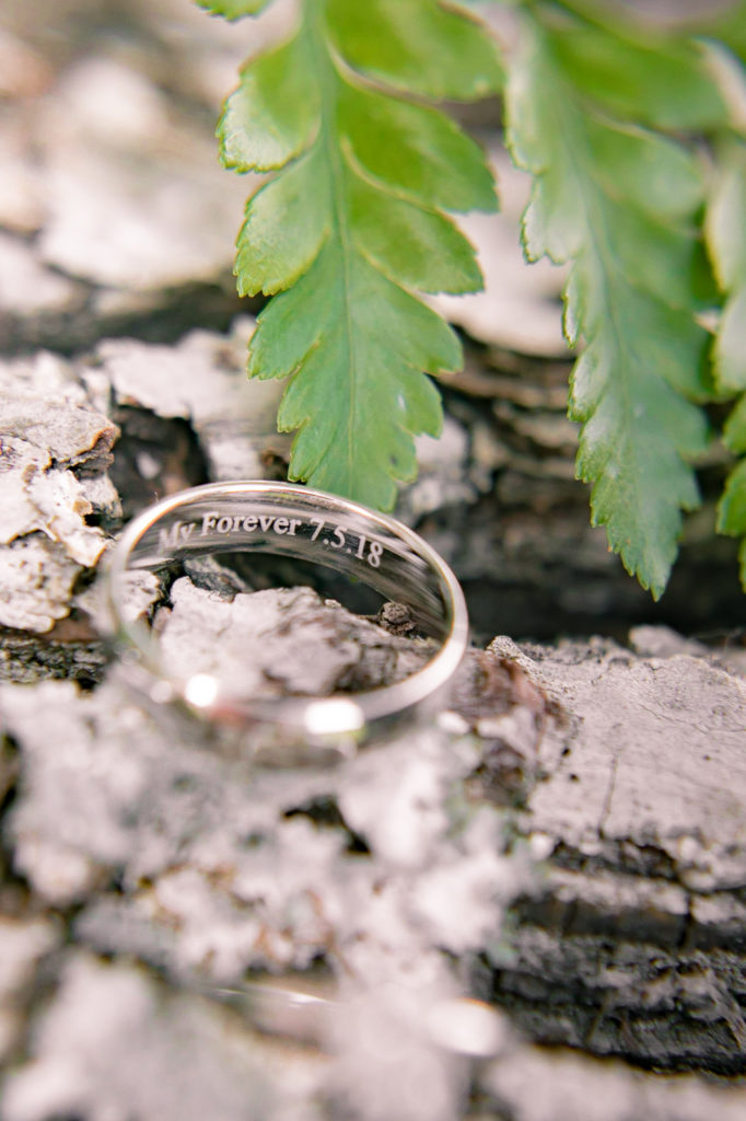 A close up of an engraved ring for a summer frederick maryland wedding