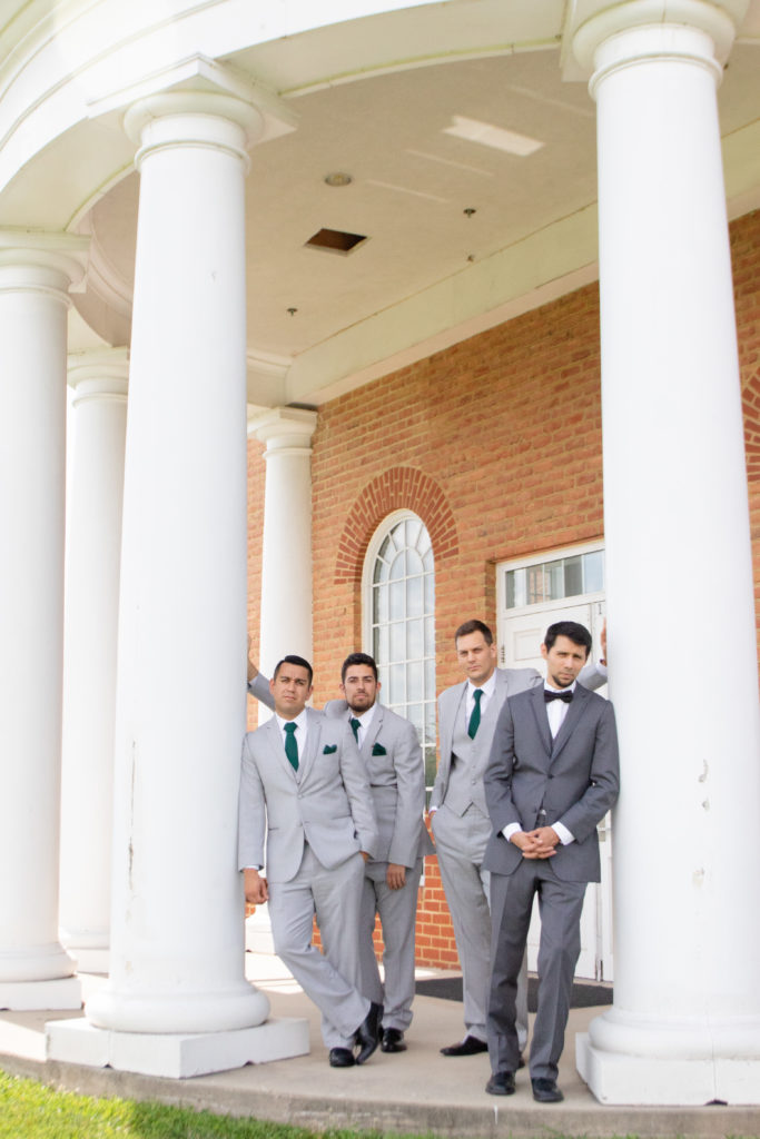 Groom and Groomsmen Getting Ready Portraits in a summer Frederick Maryland Wedding with emerald green ties