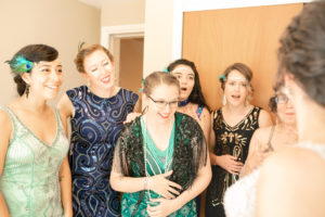 US Naval Wedding in Annapolis Maryland in August- Bride's first look with bridesmaids. 1920's themed wedding