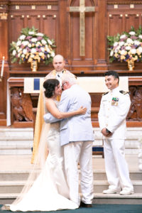 US Naval Wedding in Annapolis Maryland in August for a 1920's themed wedding. Ceremony in USNA Chapel. Tearful father daughter moment