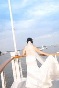 Yacht Wedding in Annapolis Maryland in August for a 1920's themed wedding. Brides portraits