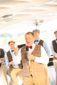 Yacht Wedding in Annapolis Maryland in August for a 1920's themed wedding. Toasts