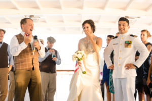 Yacht Wedding in Annapolis Maryland in August for a 1920's themed wedding. Toasts