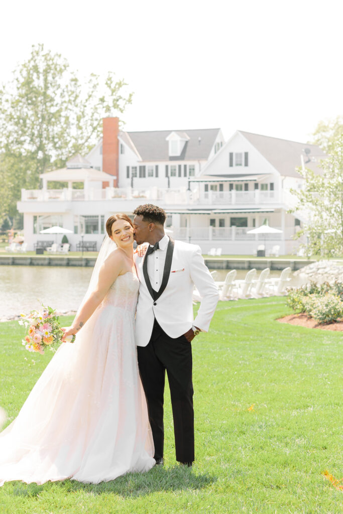 Maryland Wedding Photographer takes a photo of a bride and groom outside the Oaks Wedding Venue