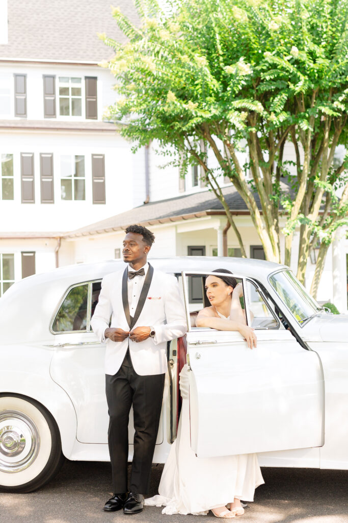 Maryland Wedding Photographer takes a photo of a bride and groom outside the Oaks Wedding Venue