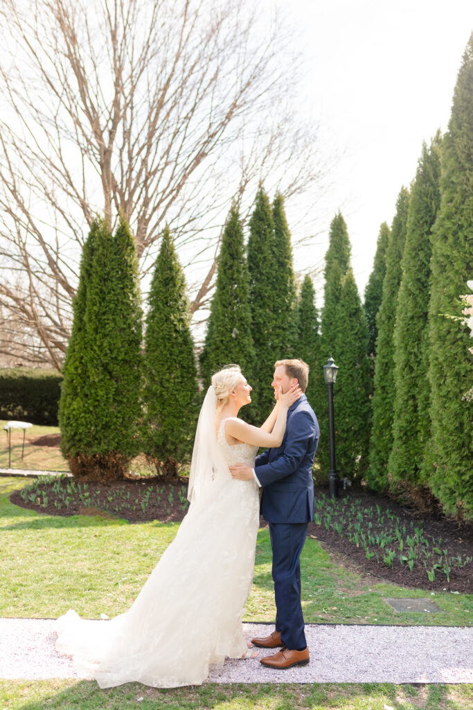 A bride and groom share a first look at the Antrim 1844 Hotel with Maryland Wedding Photographer
