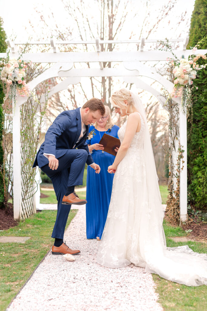Maryland Wedding Photographer photographs the breaking of the glass at Antrim 1844 