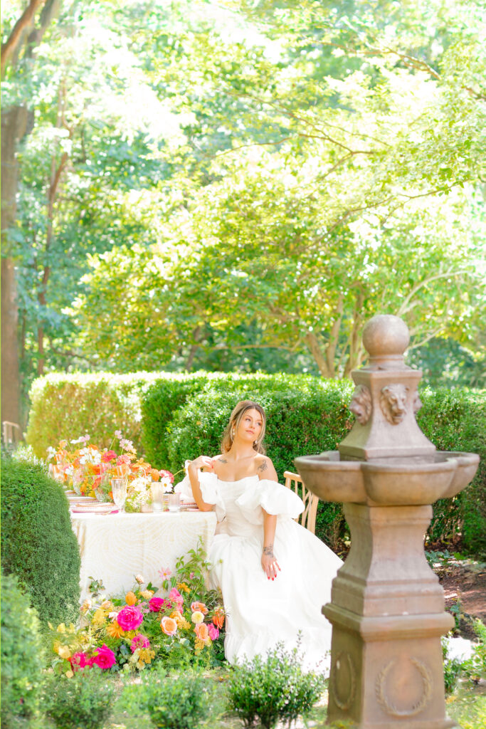 Maryland Wedding photographs snaps a photo of a bride at Pleasant Hill House