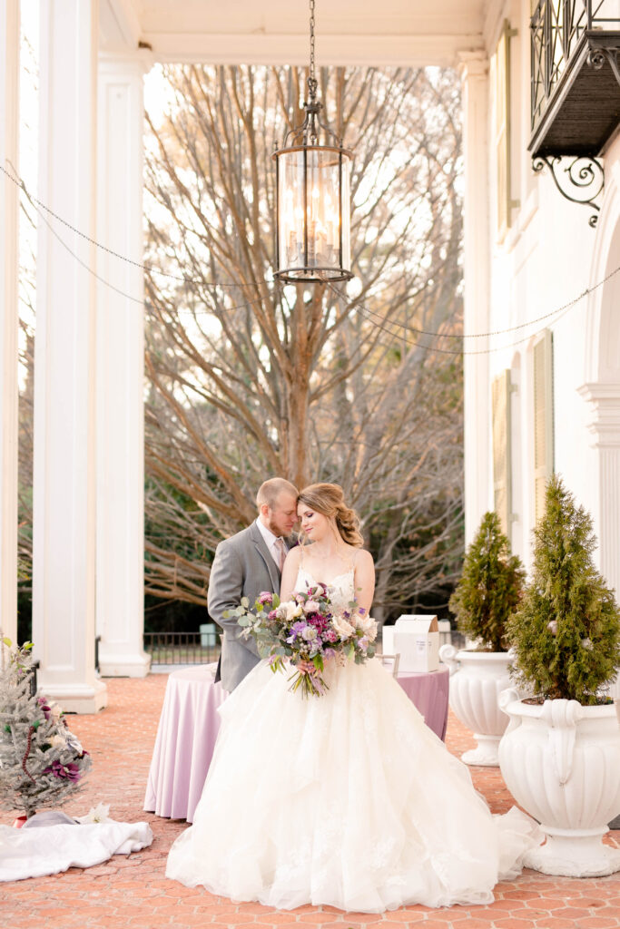 Maryland Wedding Photographer takes a photo of a bride and groom outside the Grey Rock Mansion
